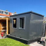 Black container garage 2 x 2 meters